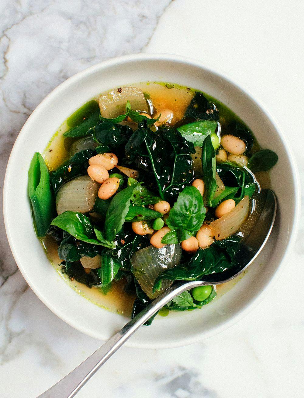 green vegetable soup in white bowl