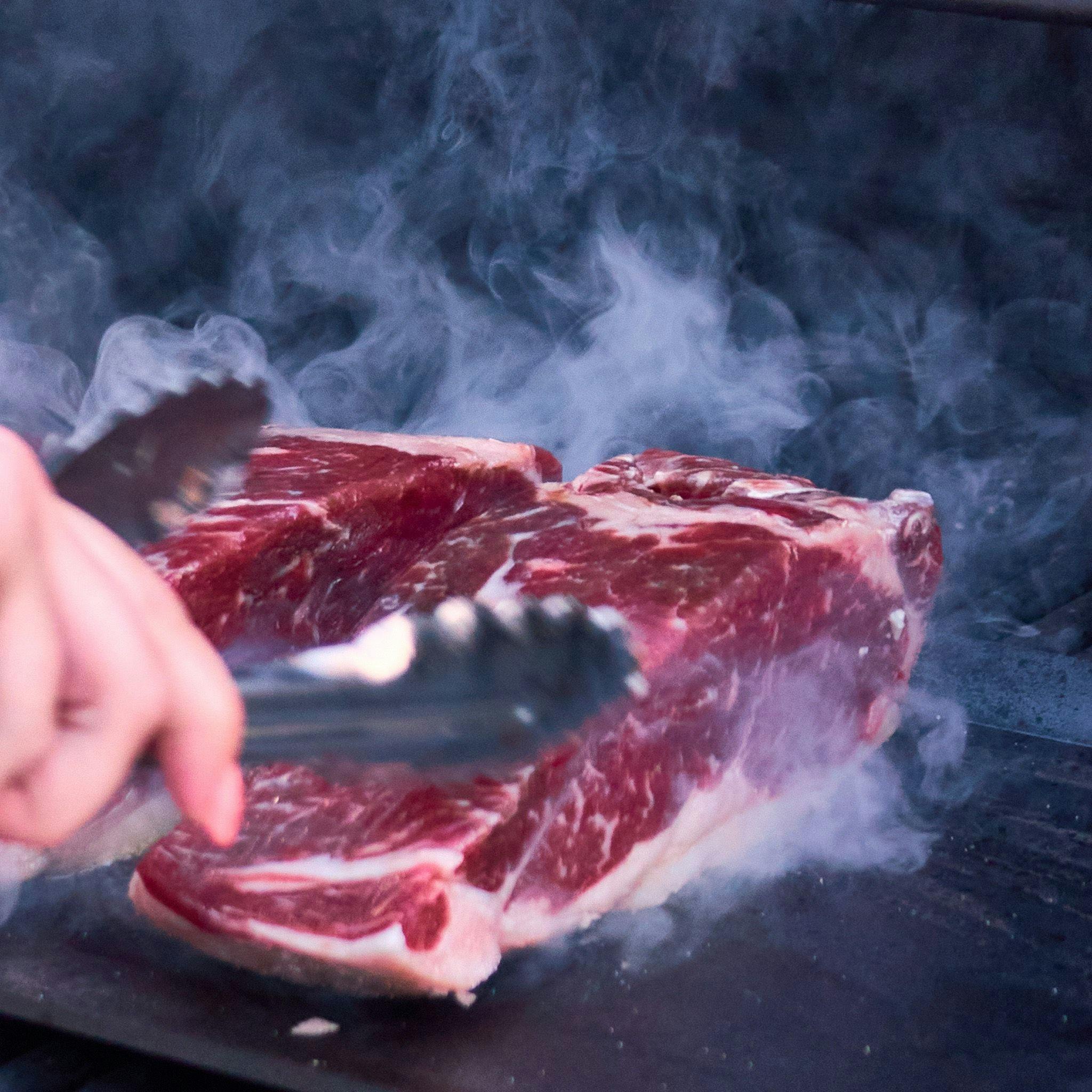 Searing steak on griddle