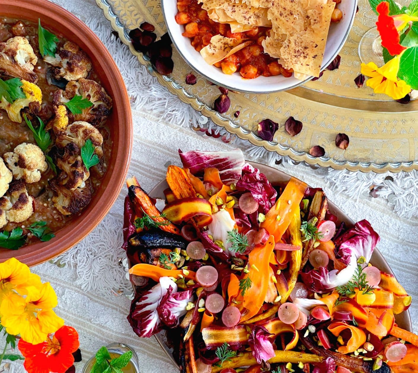Moroccan spread of spiced chickpeas with crispy phyllo, carrot ribbons and radicchio salad, and stewed cauliflower