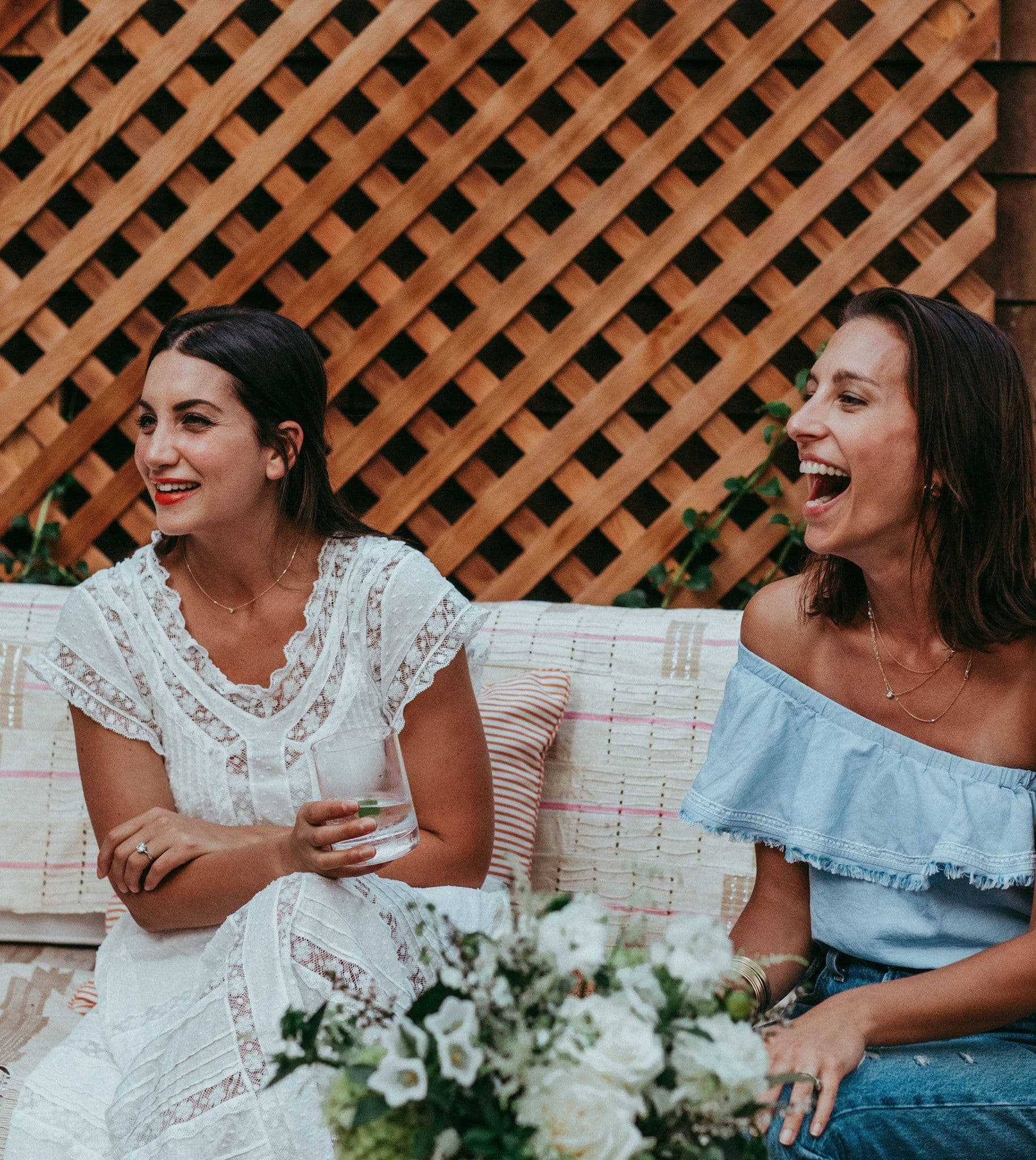 two women enjoying themselves at a party